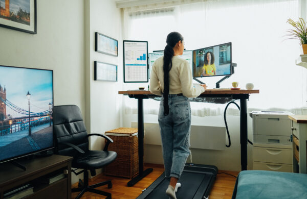 Woman working from home at standing desk
